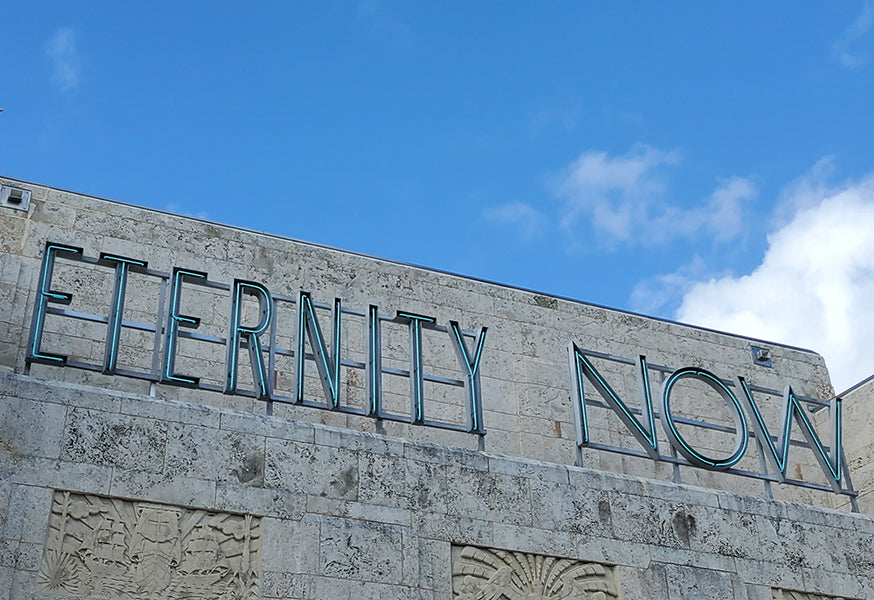Image of the Eternity Now  Neon sign above the Bass Museum in Miami.