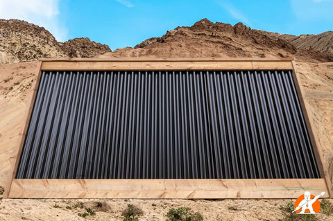 Corrugated Metal Fence Framed In Pressure Treated Lumber