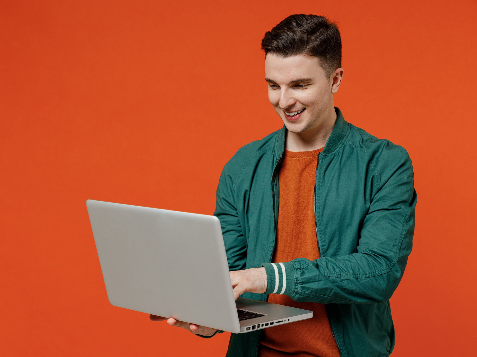 A young man working on his laptop