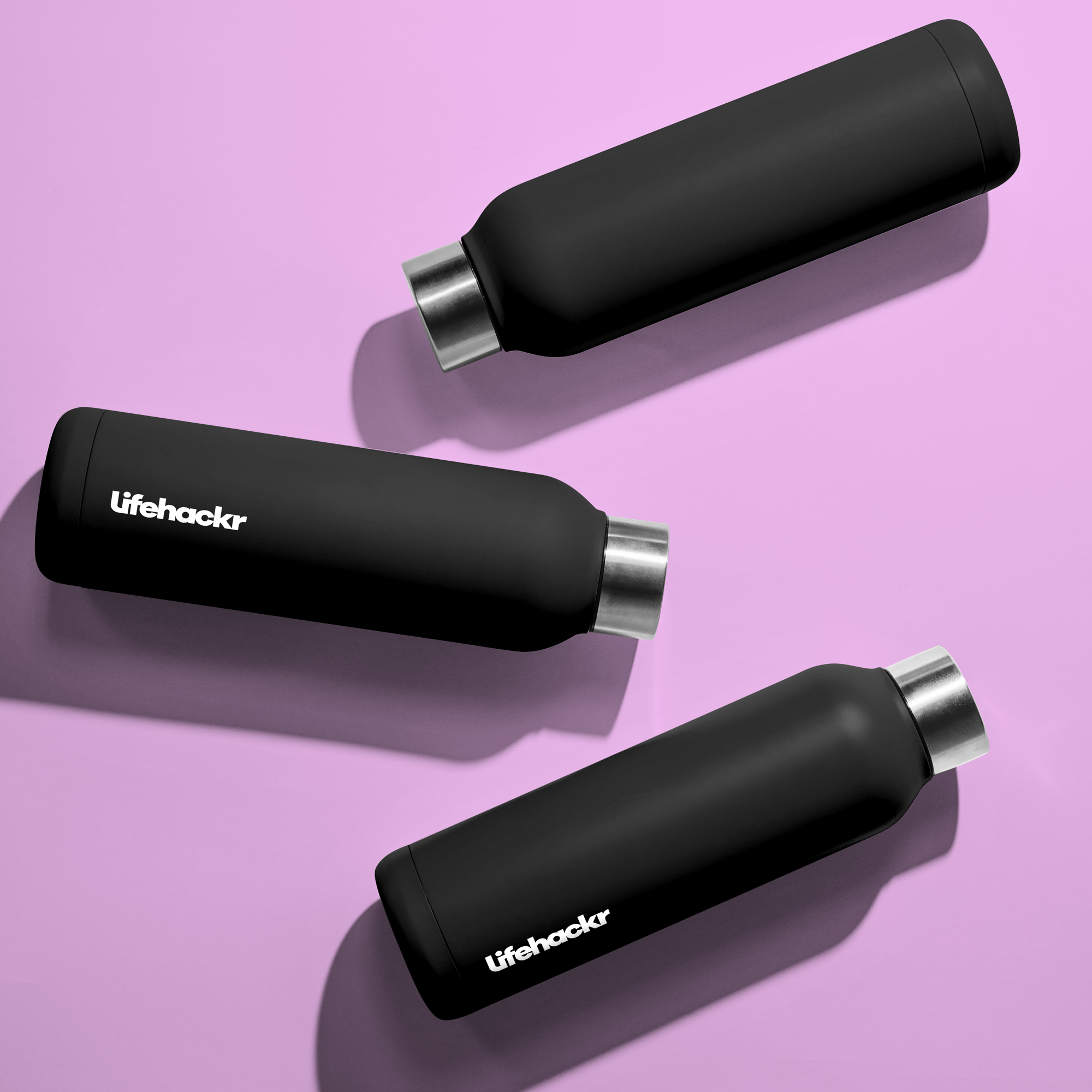 Three LIFEHACKR Smart Bottles on a plain background