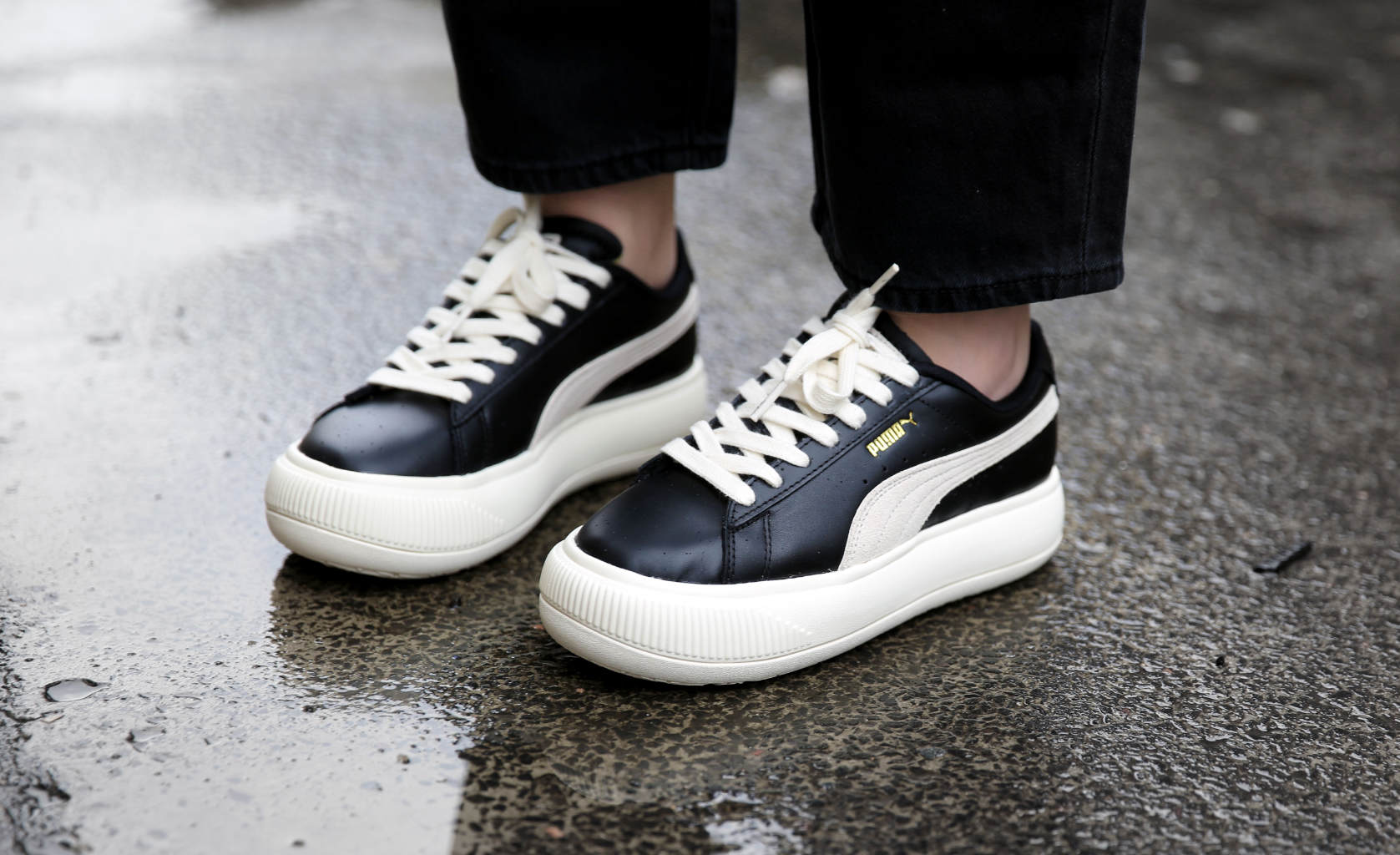 Pair of White/Black Puma Suede trainers