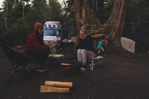 camping equipment, fairy lights, campfire, grilling, camping blanket, enamel dishes