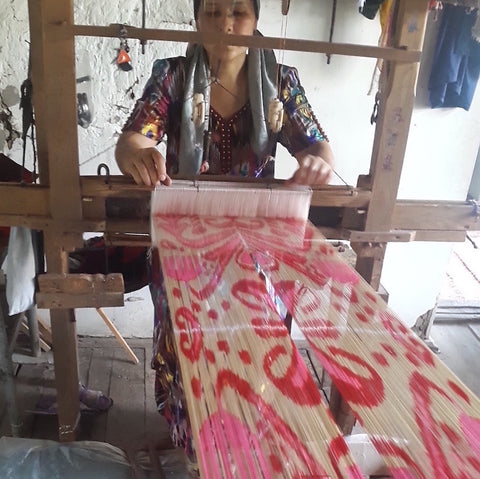 Weaving silk Ikat in Uzbekistan on hand loom