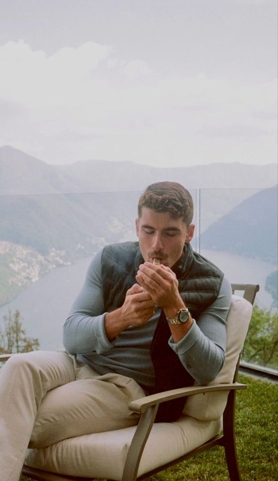 Iman Gadzhi Smoking a Cigar