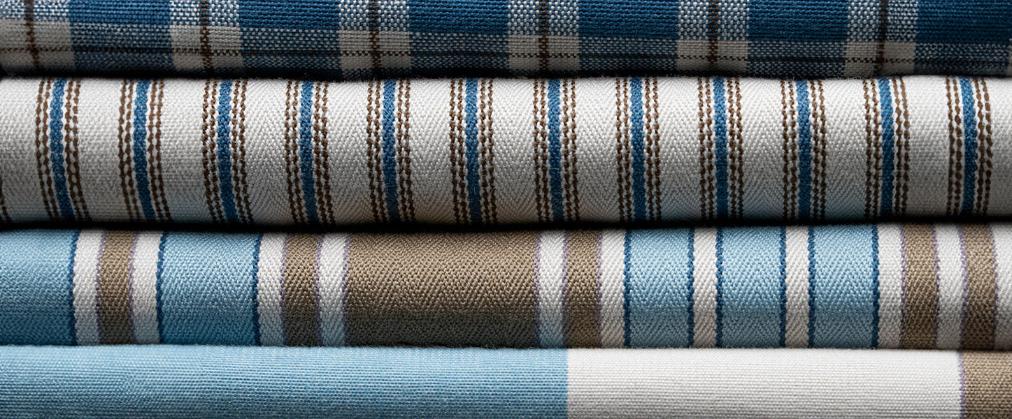 Neatly stacked rolls of high-quality Nix fabrics