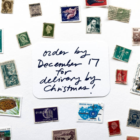 Words 'order by December 17 for delivery by Christmas!' surrounded by stamps