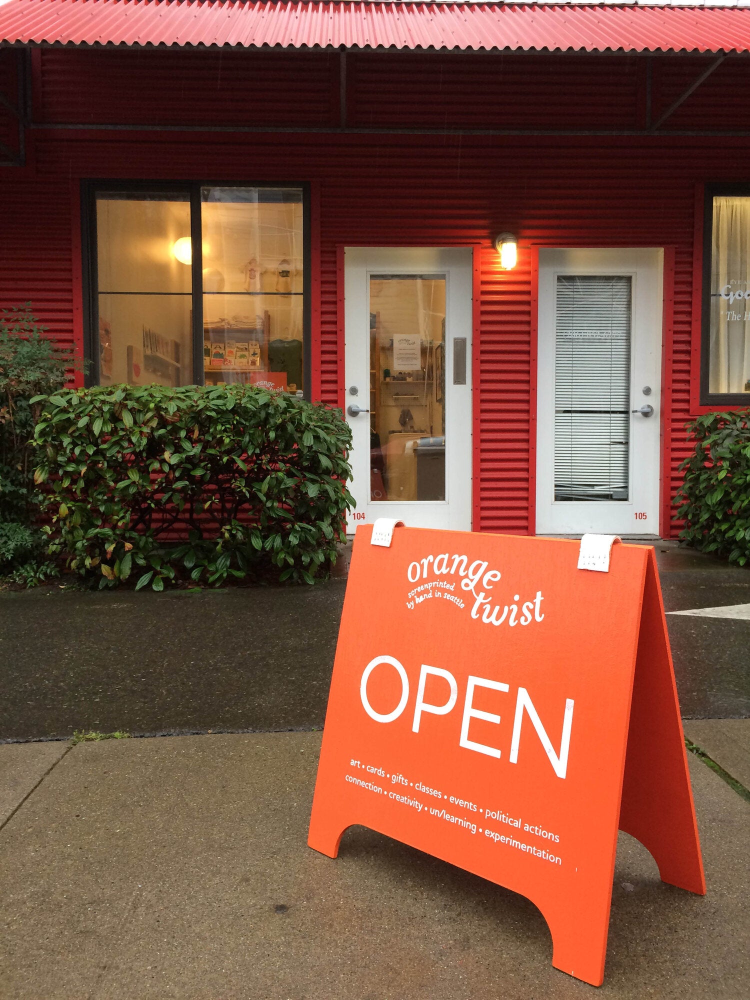 Sandwich board outside the physical space for Orange Twist Cards, in March 2020