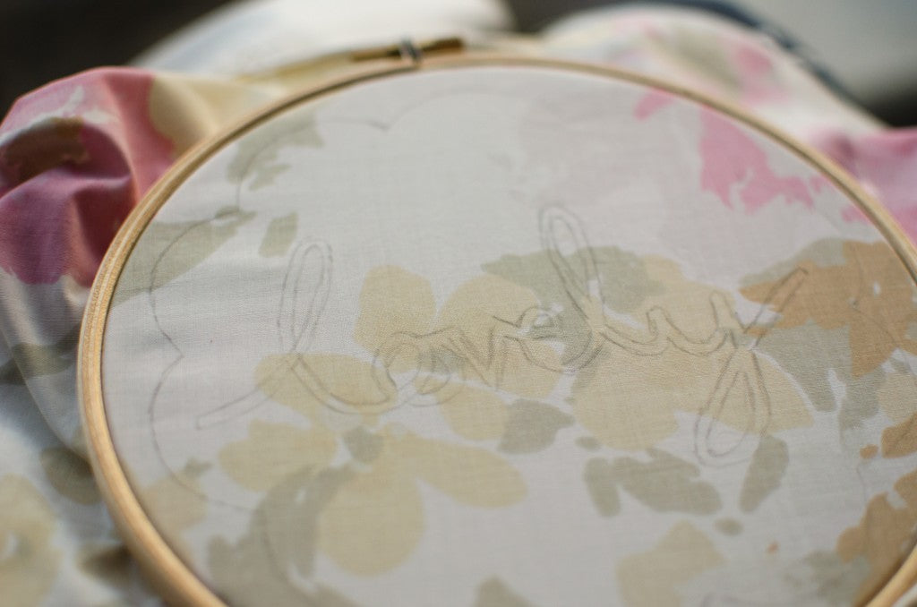 Vintage floral fabric in embroidery hoop