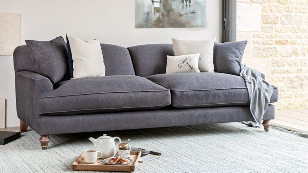 5 cushions on sofa
