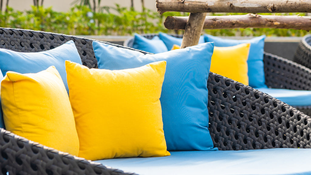 yellow outdoor cushions and blue outdoor cushions