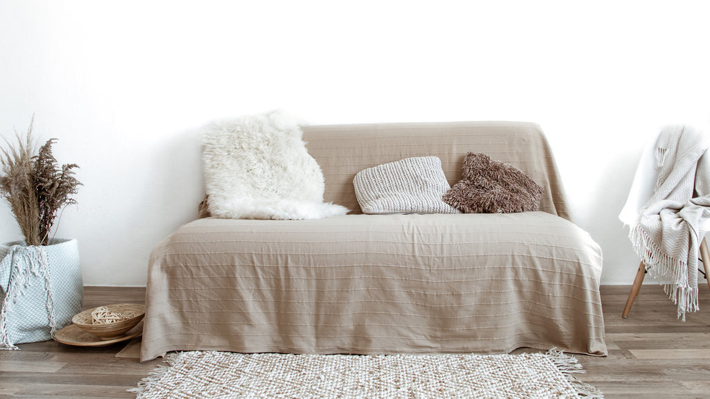 sheepskin cushion on sofa