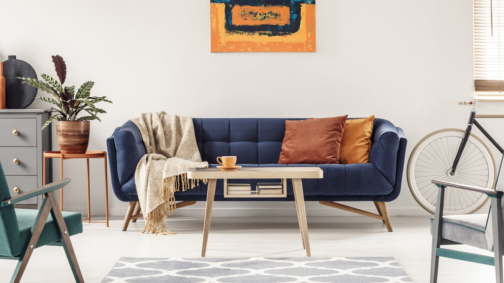 ochre and orange covers on a sofa