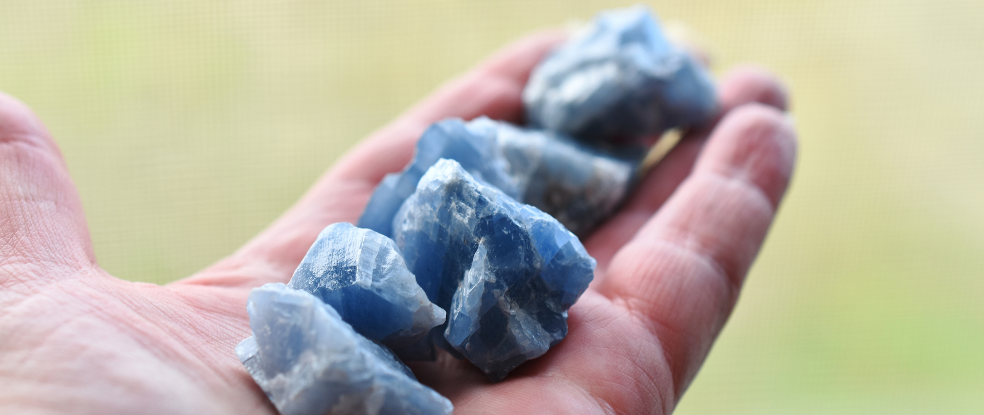 Blue Calcite in Hand.png