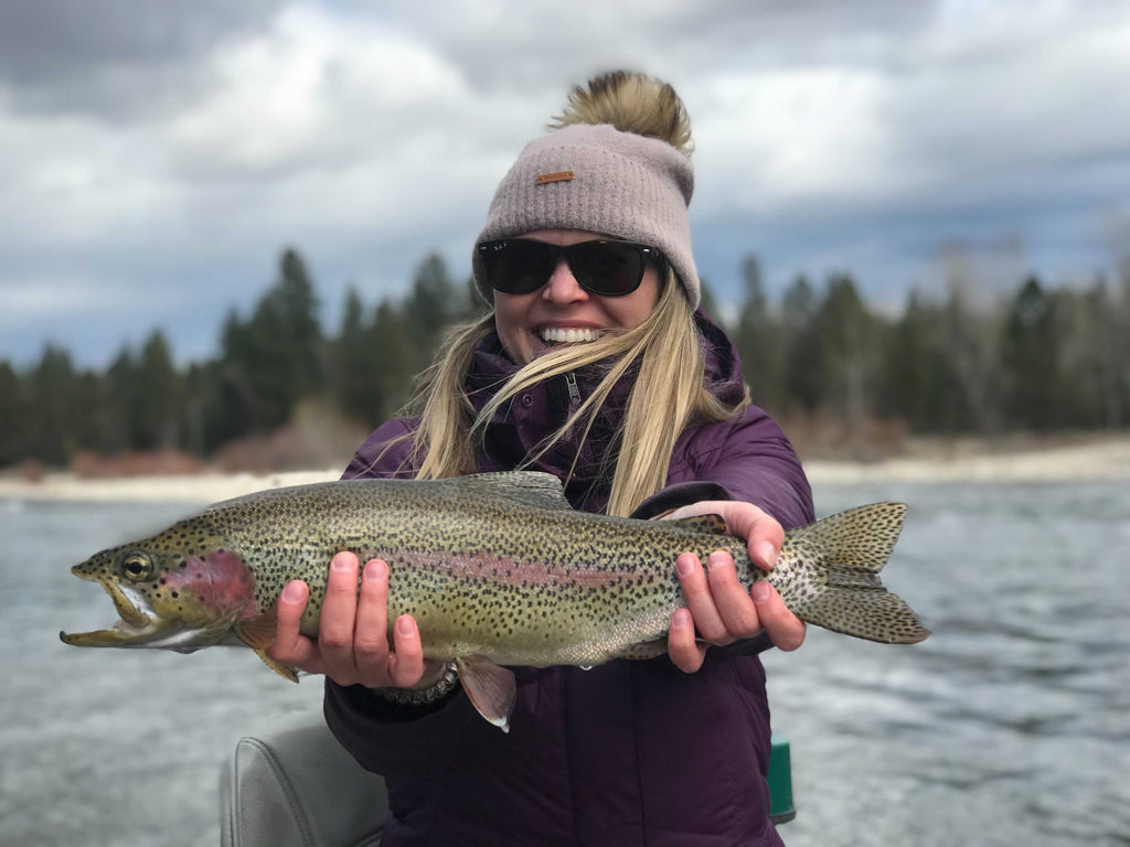 person holding a fish