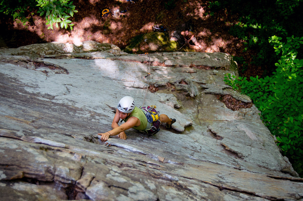 Climbing and Mental Game - female climber sport climbing outdoors