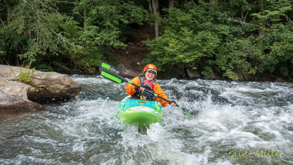 Kayaker hitting a rapid on the Upper Hooch