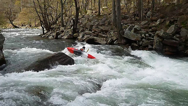 Kayaker sideways on a rapid on the Nantahala River