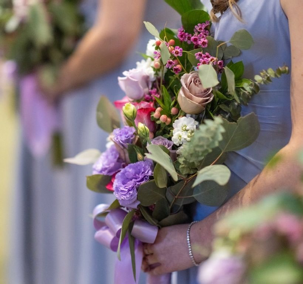 A stunning bouquet of dried flowers in bold color combinations.