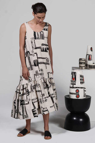 Woman wearing a dress by TradetheMark & Milk and Thistle collaboration
