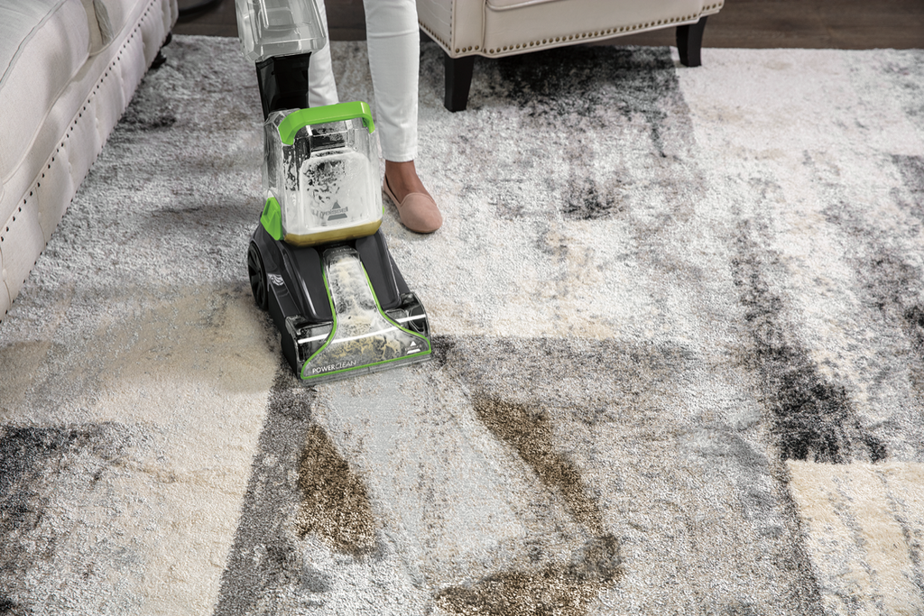 Bissell PowerClean Pet Carpet Washer 2889F cleaning a stain on some light coloured carpet