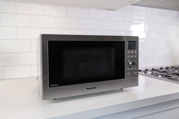 Panasonic NNCD58JSQPQ convection microwave side angle view on a benchtop