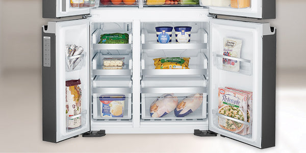 image showing the bottom two doors on a quad door fridge open