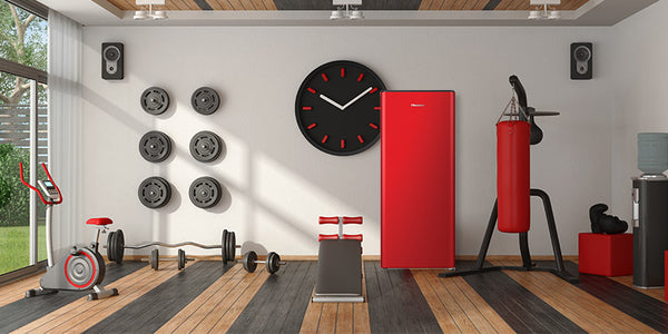 put a hisesnse red bar fridge in your home gym for ice cold refreshment