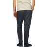Back view of a person in a beige shirt and Herno's navy blue nylon stretch drawstring trousers, with hands in pockets.