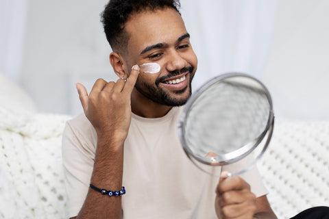 Young male skincare routine in the article Skincare FAQs