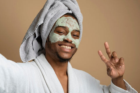 Melanin Skincare - close-up-smiley-man-with-face-mask