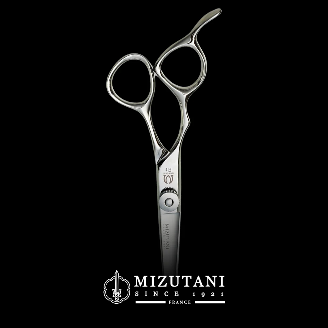 Professional hairdressing scissors with logo on a black background.