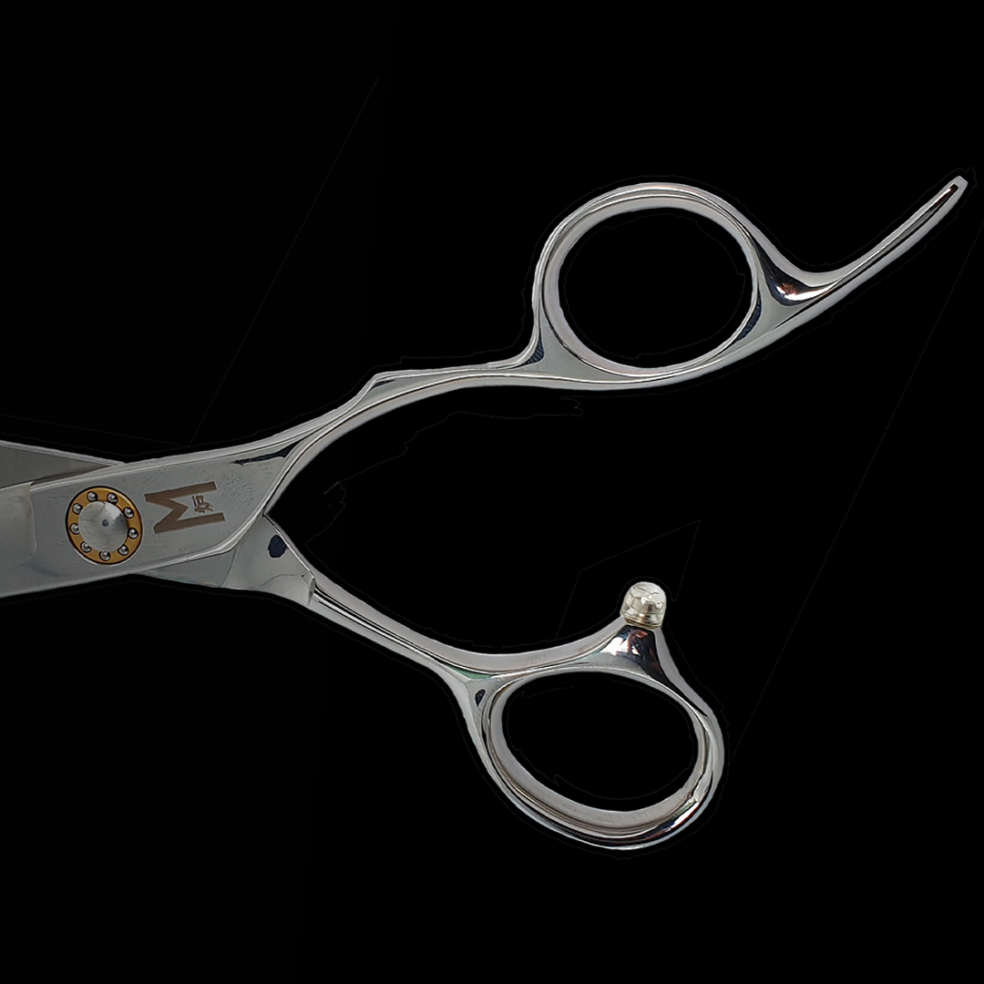 A pair of professional hairdressing scissors on a black background.