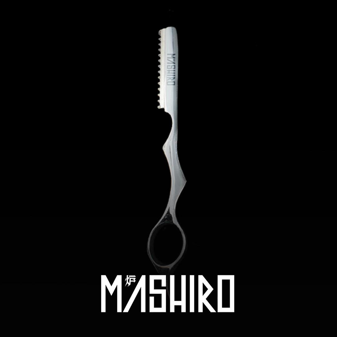 A silver-colored, serrated blade scissors with 'MASHIRO' branding on black background.