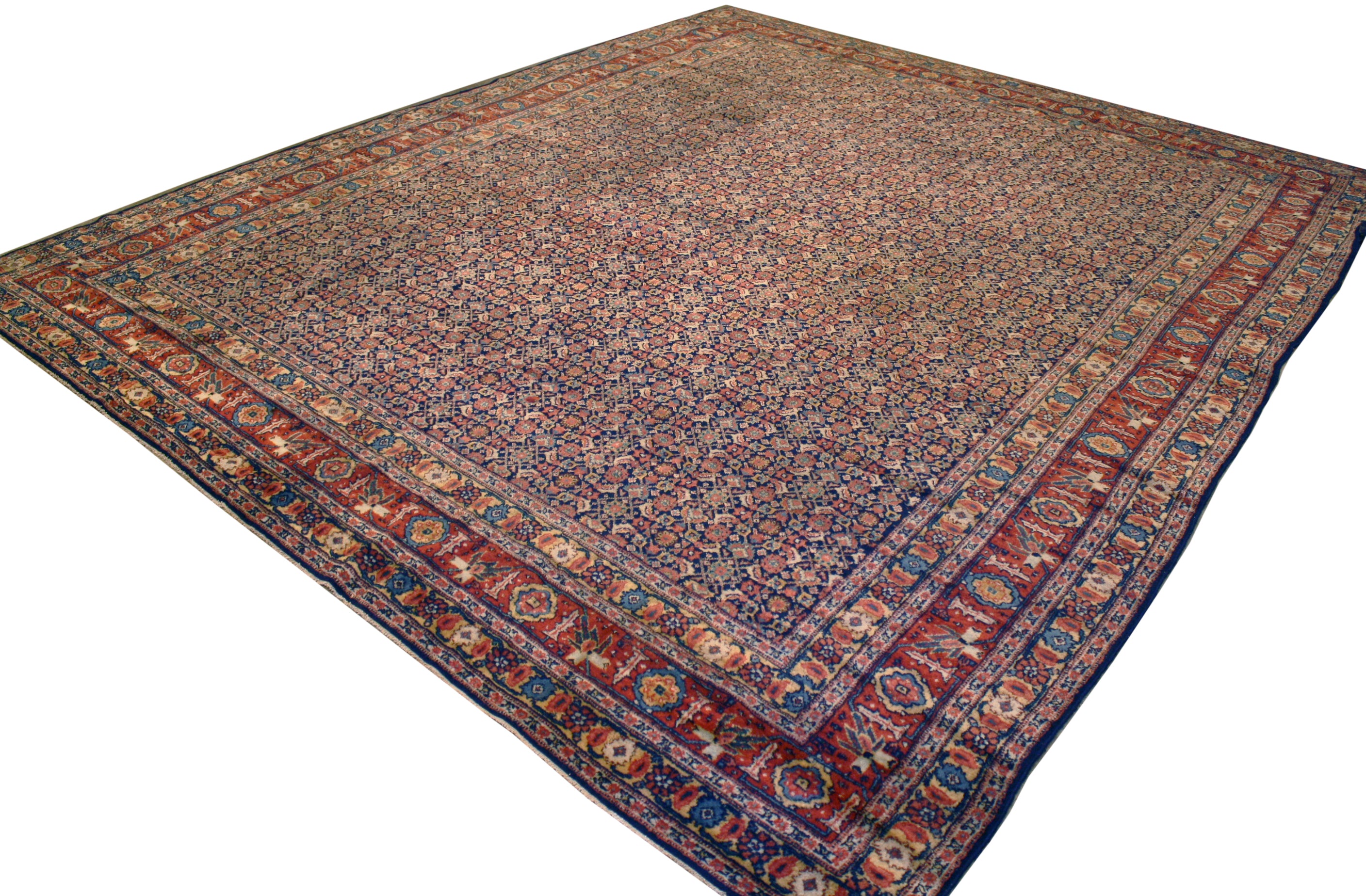 Repaired antique Persian rug