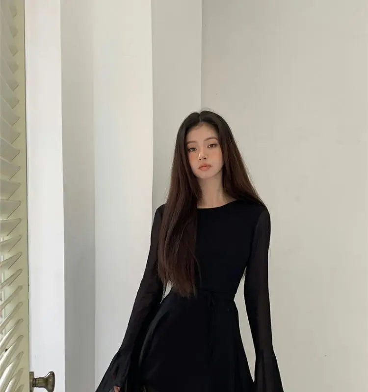Elegant Backless Black Mini Dress with Lace-Up Detailing - Image 13