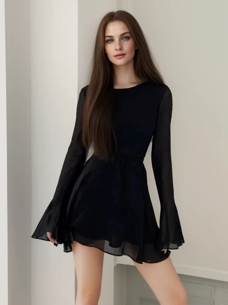 Elegant Backless Black Mini Dress with Lace-Up Detailing - Image 10