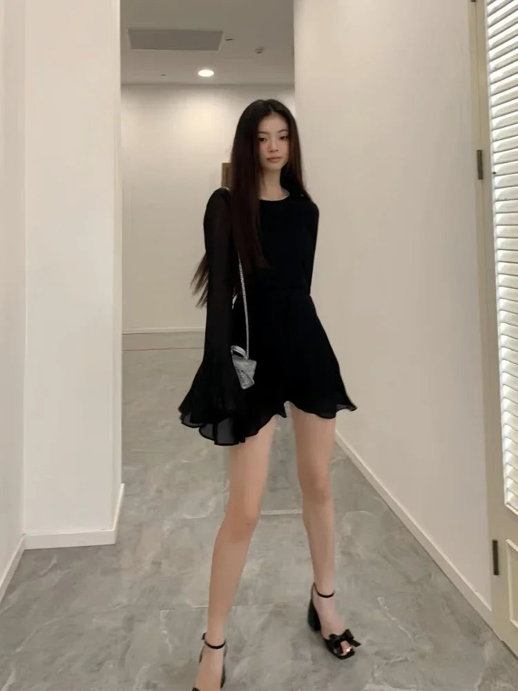 Elegant Backless Black Mini Dress with Lace-Up Detailing - Image 6