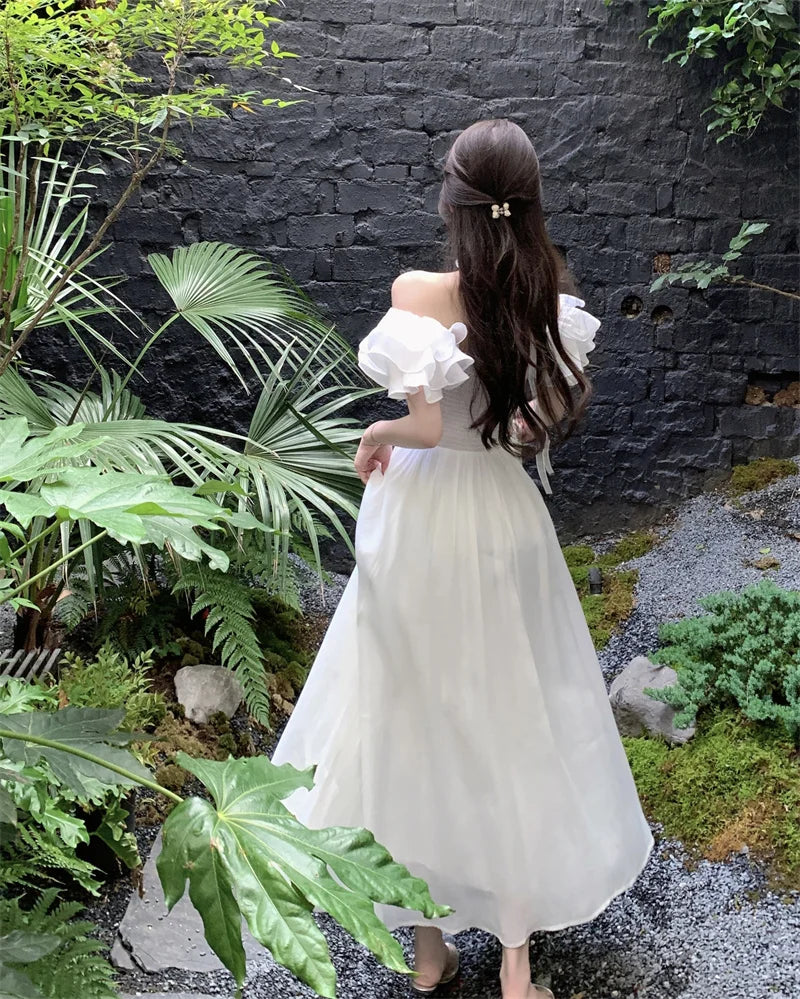 Elegant White Strapless Midi Dress for Summer Parties - Image 26