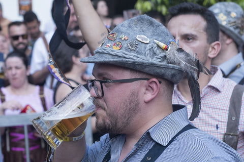 mean with beer in hand  at oktoberfest
