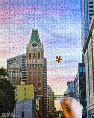 Jigsaw puzzle featuring the Tribune Tower building at sunset