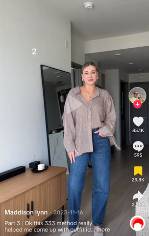 screengrab of Maddison lynn on TikTok demonstrating the 333 method to create a capsule wardrobe