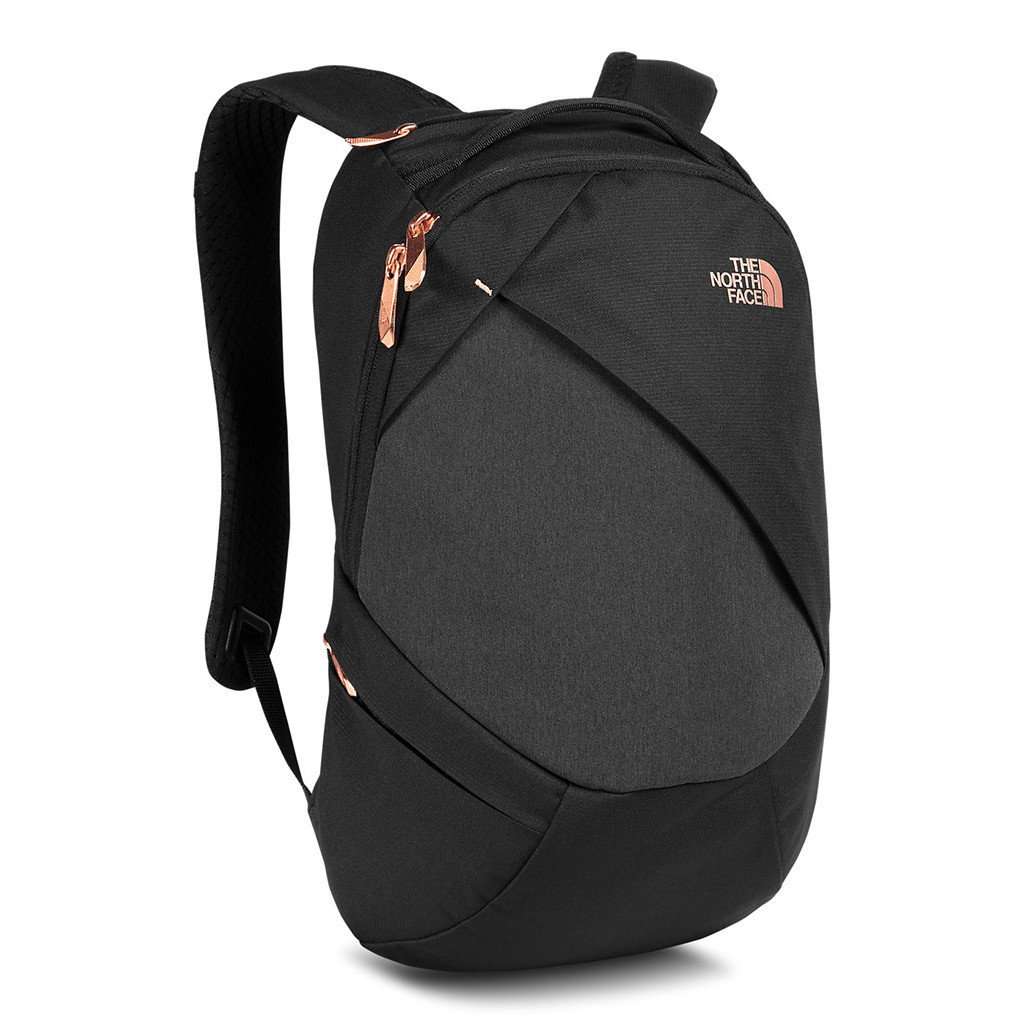 north face white and rose gold backpack