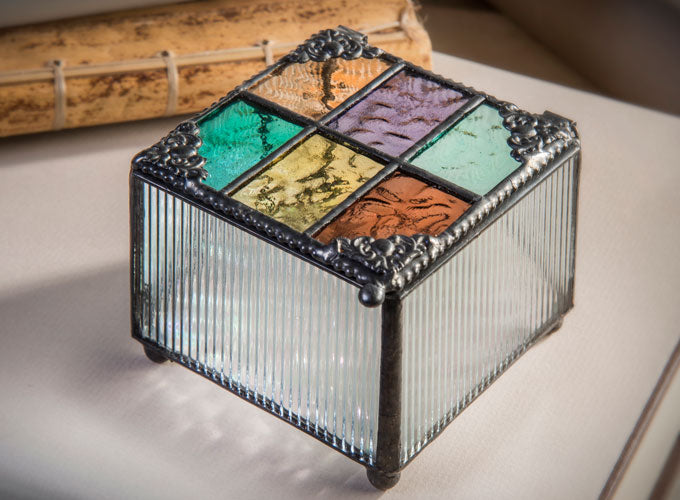 Box 815 multi-colored English muffle glass jewelry box by J. Devlin