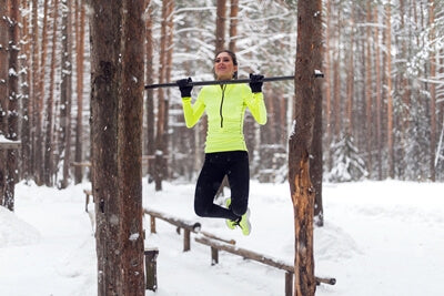 outdoor pull up bar between trees