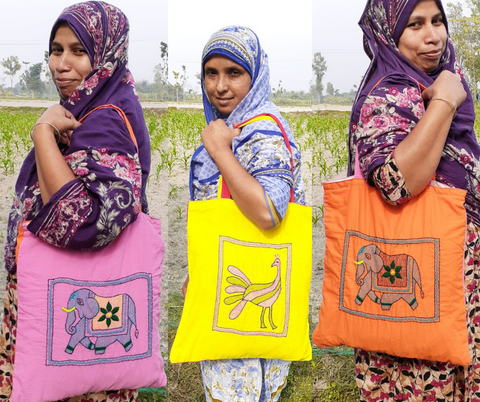 Khushi Kantha Rangpur (peacock) tote bags modelled by our artisans
