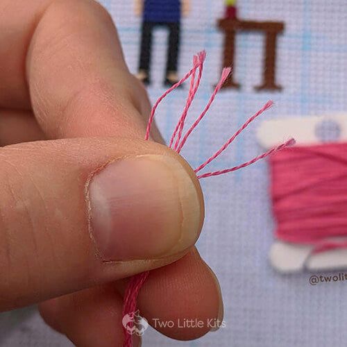 Close up of embroidery thread showing 6 strands