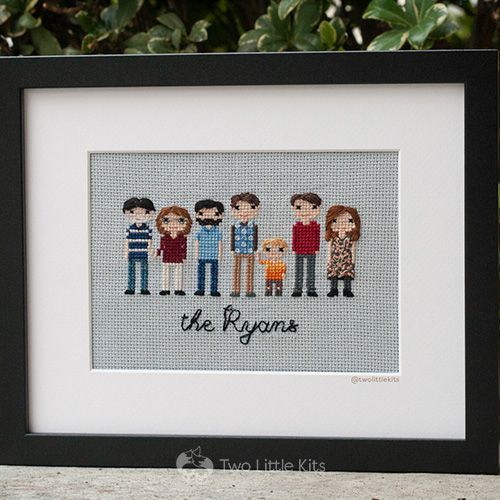 Cross-stitch finished piece: A multi-generational family of 7 with the writing "the Ryans"