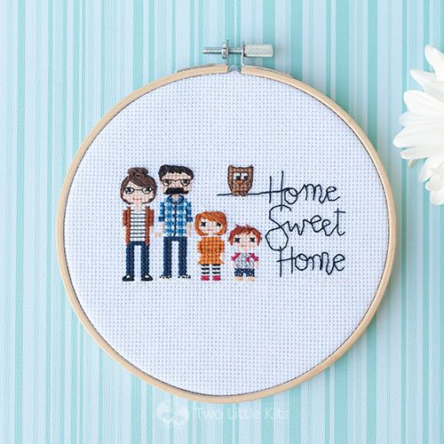 Cross-stitch finished piece: A family of 4 with a custom request of an owl for personal reasons