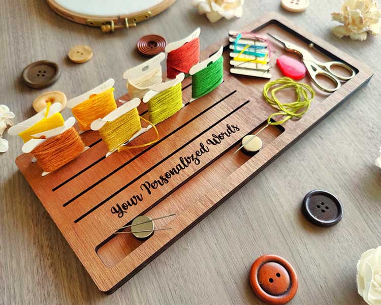 A wooden, personalised thread and project organiser