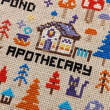 Close-up photograph of the completed cross-stitch